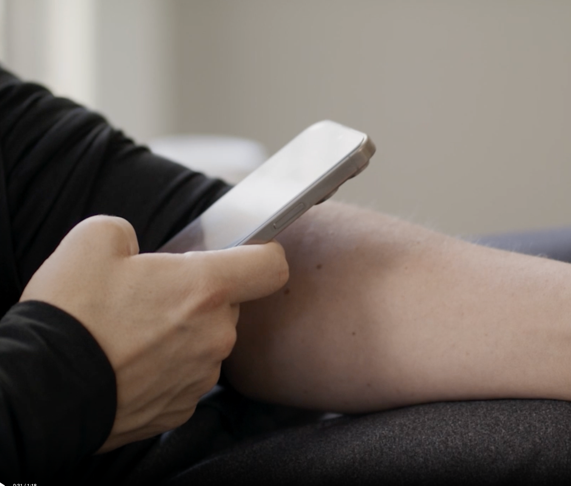 Person taking a photo of their skin condition